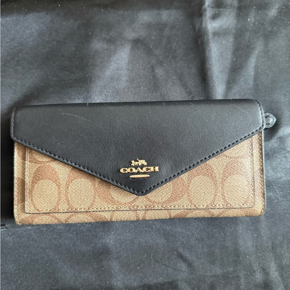 *** SOLD *** Coach Black and Brown Signature Wallet